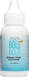 A bottle of Bold Hold Extreme Creme lace wig glue adhesive with a white and blue label.